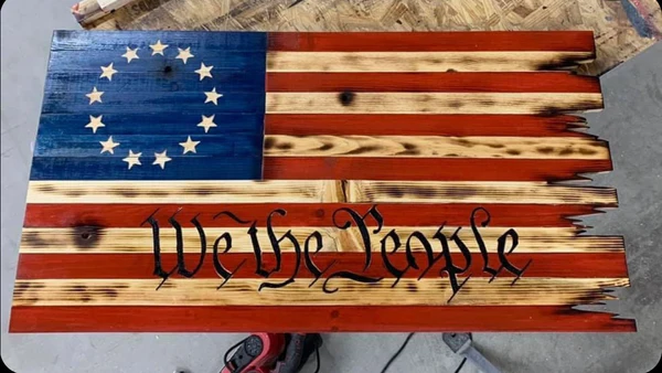 Betsy Ross style wooden flag with We the People